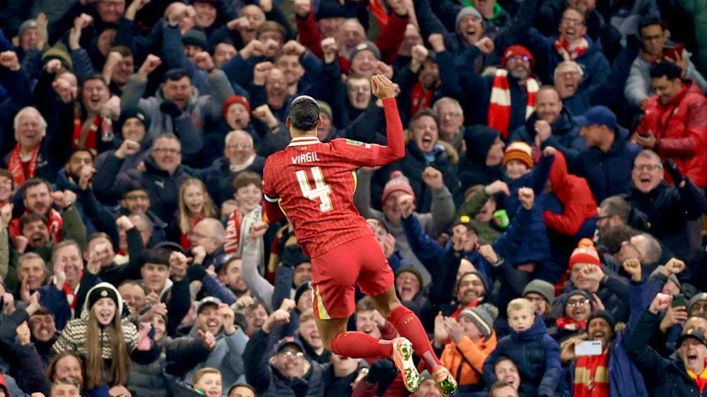 Virgil van Dijk celebrates his goal for 4:0 with a leap towards the fans