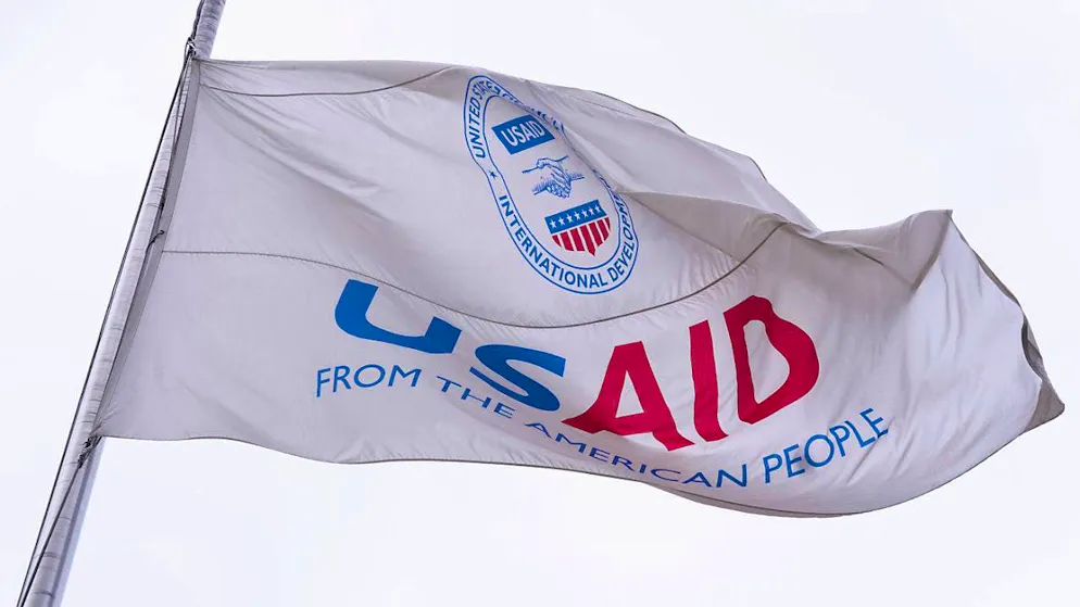 ARCHIVE - The flag of the US Agency for International Development (USAID) flies in front of the USAID office in Washington. Photo: Manuel Balce Ceneta/AP/dpa
