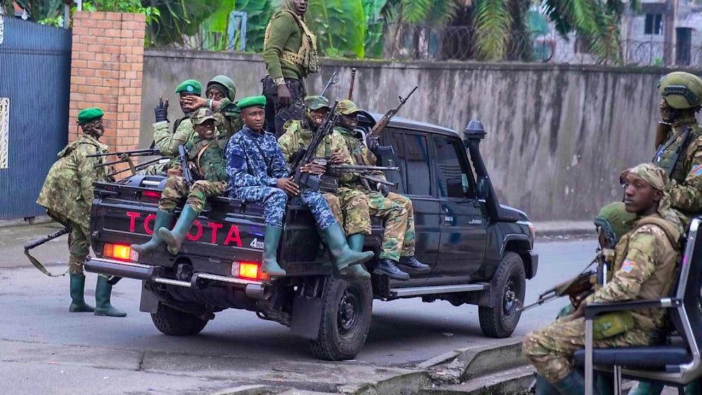 ARCHIVE - M23 rebels patrol the streets of Goma. Photo: Brian Inganga/AP/dpa