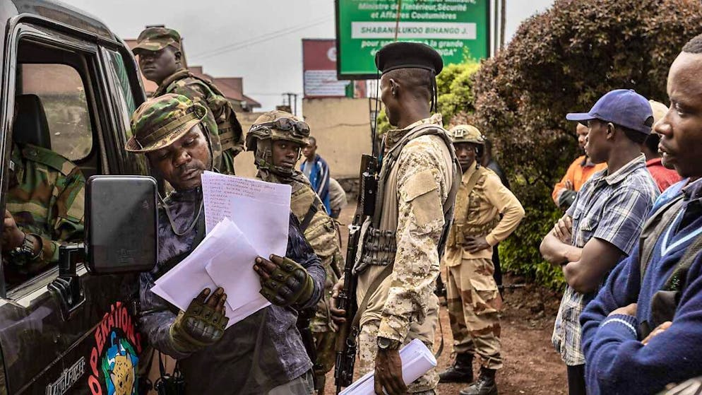 M23 fighters gather with new recruits at a police station in Goma, North Kivu, on February 6, 2025.