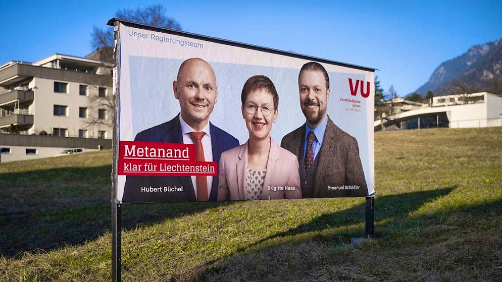 An election poster of the Patriotic Union (VU) in Vaduz with the candidates for government council Hubert Büchel, Brigitte Haas and Emanuel Schädler (from left).