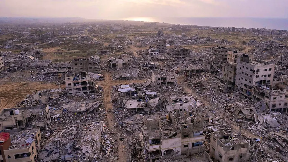 ARCHIVE - Buildings destroyed by the Israeli air and ground offensive are seen in the Tel al-Hawa neighborhood in the Gaza Strip. Photo: Mohamamd Abu Samra/AP/dpa/Archive photo