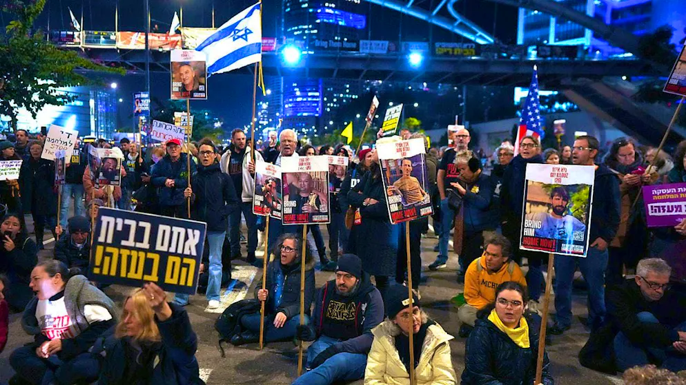 Relatives of hostages held by Hamas in the Gaza Strip protest outside the Israeli Defense Ministry in Tel Aviv after the militant group announced it would delay the hostages' release. Photo: Ohad Zwigenberg/AP/dpa