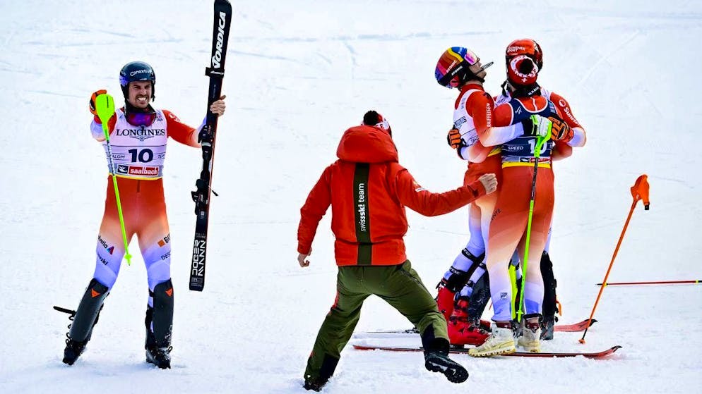 Marc Rochat (left) and his Swiss teammates are jubilant.
