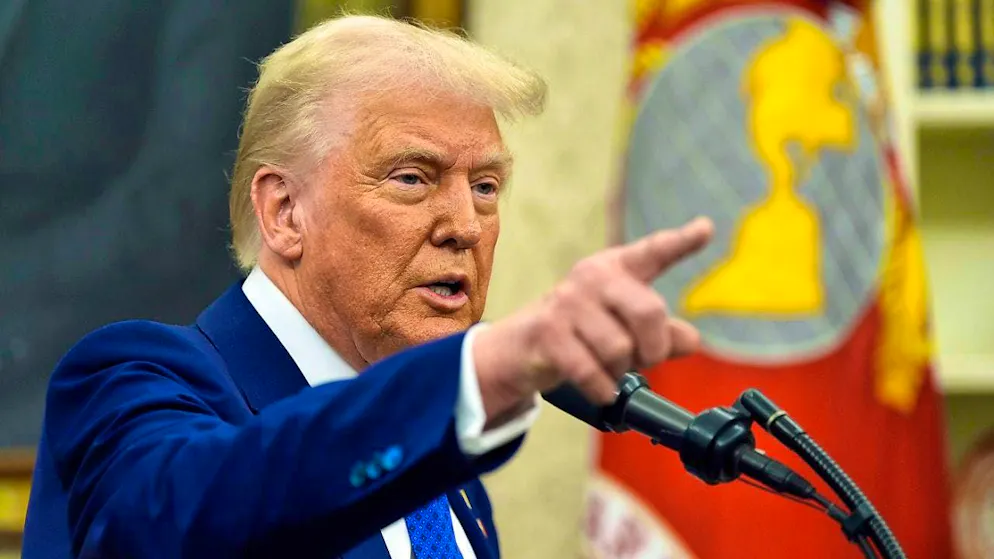 President Donald Trump speaks during Gabbard's swearing-in as intelligence coordinator in the Oval Office of the White House. Photo: Alex Brandon/AP/dpa