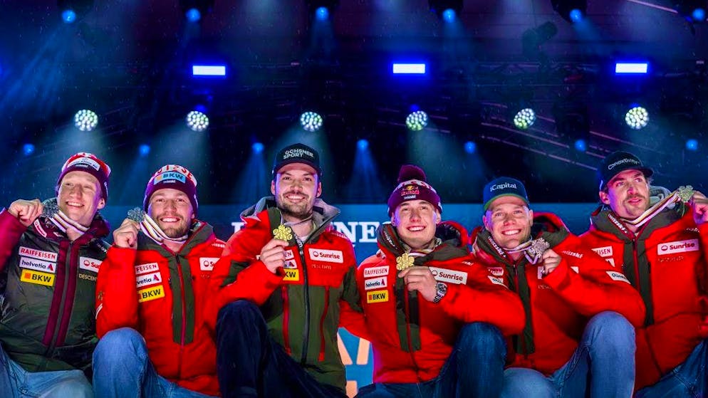 Historic winner photo: Swiss ski stars Nef, Monney, Meillard, von Allmen, Rogentin and Rochat (from left) took all the medals in the team competition.