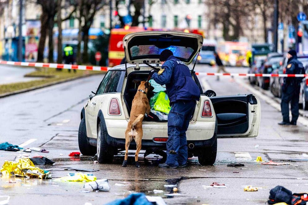 Vehicle driven into group of people in Munich - Gallery. Police use a sniffer dog to investigate a car not far from Stiglmaierplatz. A vehicle has driven into a group of people in Munich city center.