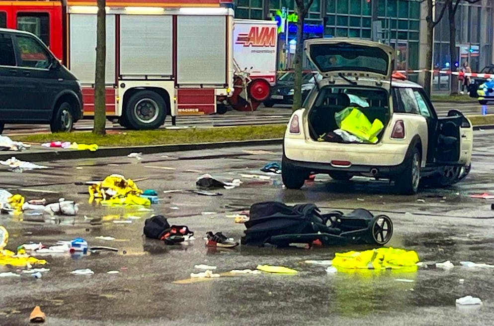 Vehicle driven into group of people in Munich - Gallery. A car near the scene.
