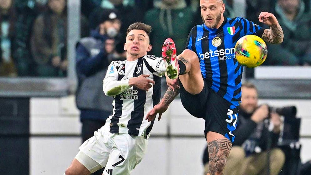 Chico Conceicao (left) celebrates a 1-0 win with Juve against Inter Milan