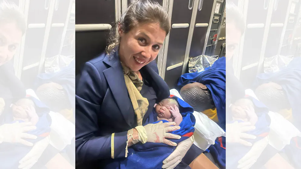 Flight attendant helps with the birth. Baby is in a hurry and is born at an altitude of eleven kilometers