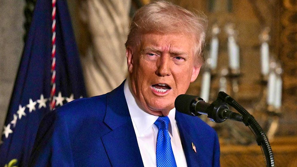 US President Donald Trump speaks at his Mar-a-Lago estate. Photo: Uncredited/Pool/AP/dpa