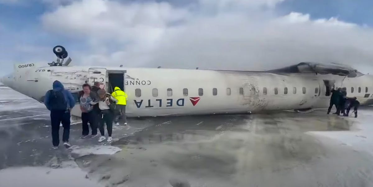 Passenger plane overturns upside down on landing in Toronto at least