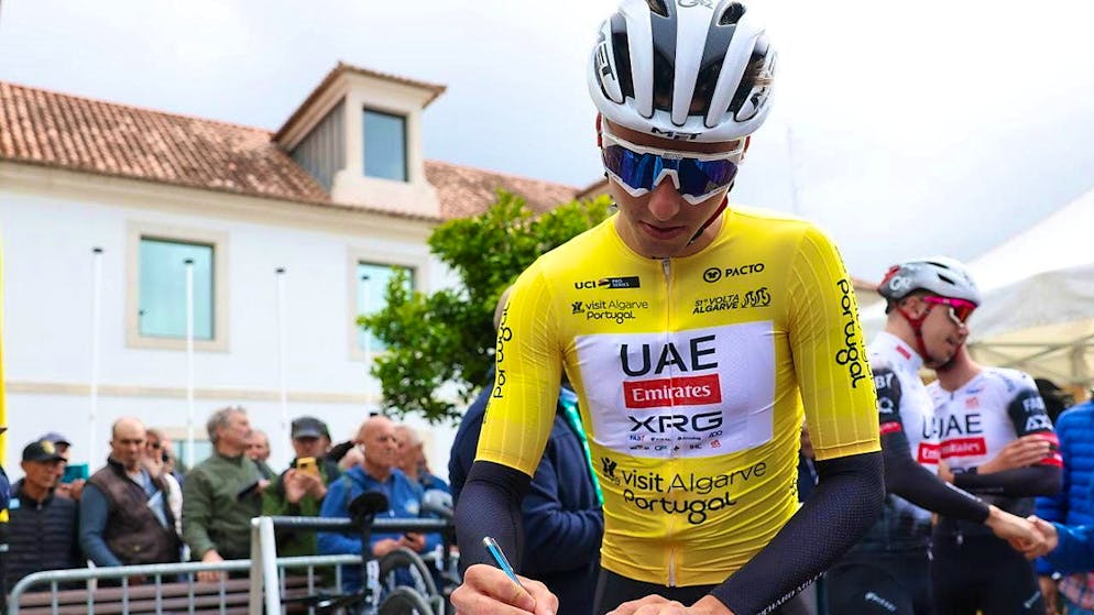 Jan Christen in yellow before the start of Friday's 183 km stage through the Algarve.