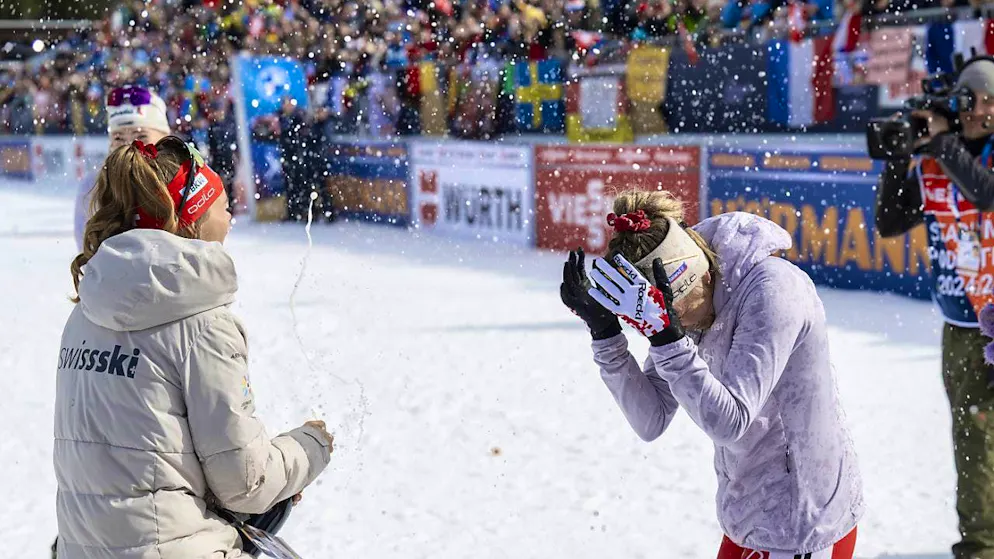 Champagne and tears to say goodbye - Gallery. Champagne shower: Elisa Gasparin is given a fitting farewell by her teammates