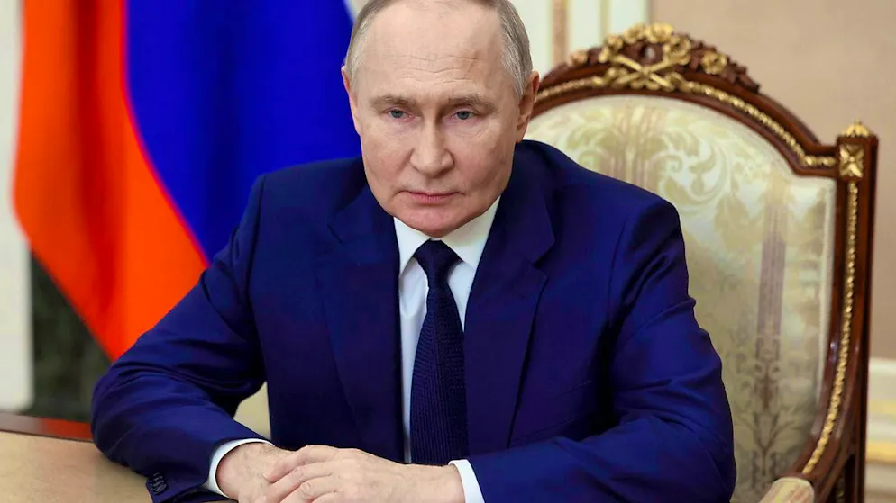 Russian President Vladimir Putin holds a video address. Photo: Mikhail Metzel/Sputnik/Pool Kremlin/AP/dpa
