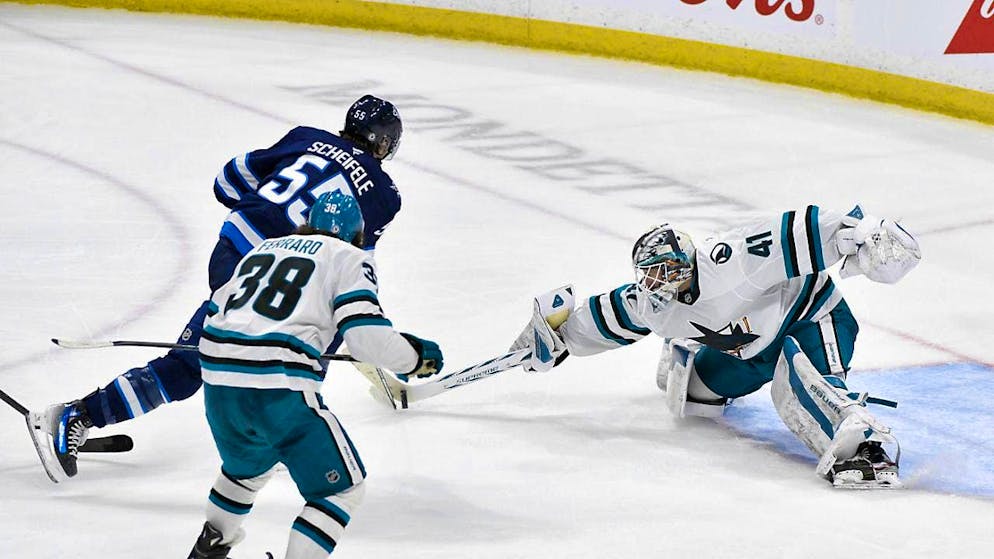 The decision: Mark Scheifele (number 55) scores in overtime to make it 2-1 for the Jets