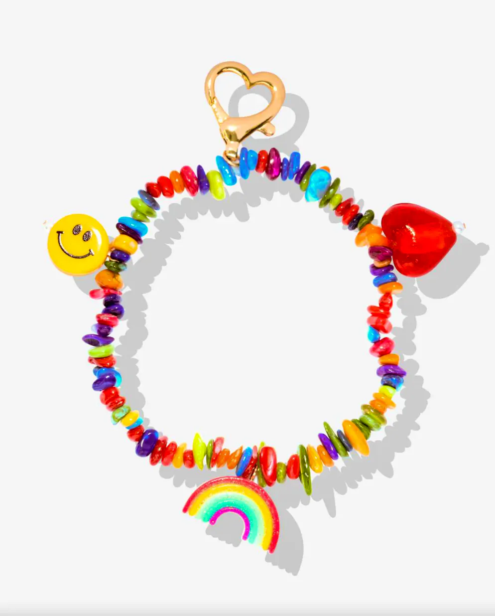 Charms für Taschen sind jetzt der letzte Schrei. Bunter Taschenanhänger mit 18 Karat vergoldetem Ring von Crystal Haze für 65 Franken, via Glambou.