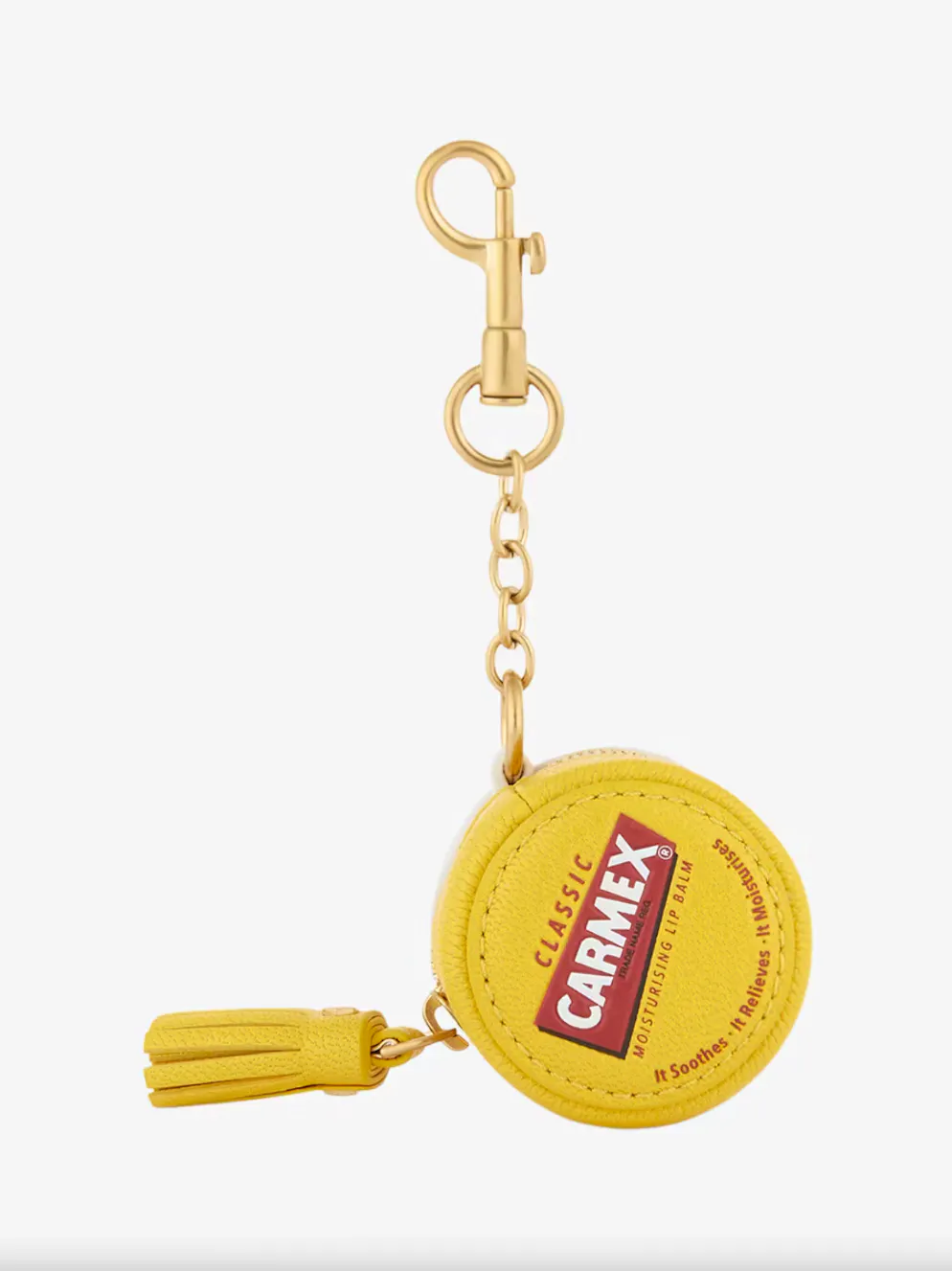 Charms für Taschen sind jetzt der letzte Schrei. Taschenanhänger in Form einer Carmex-Lippenpflege von Anya Hindmarch für 249 Franken, via Globus. 