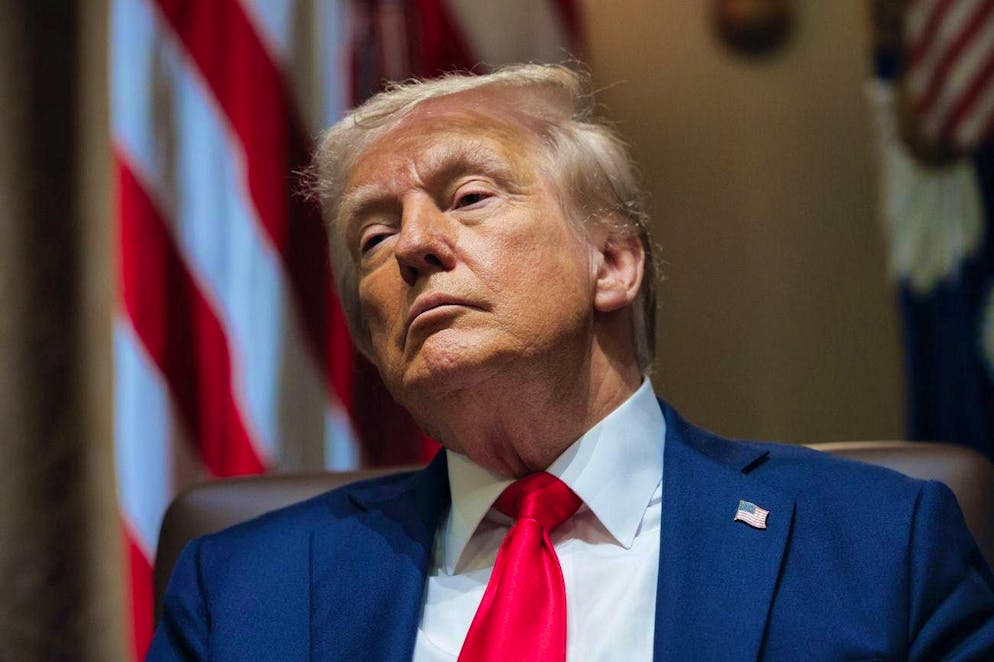 President Donald Trump listens during a cabinet meeting at the White House in Washington on Tuesday.
