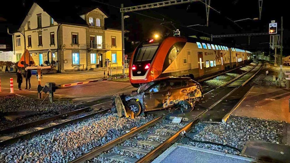 An intercity train hit the car stuck on the tracks - a regional train had already crashed into the car.