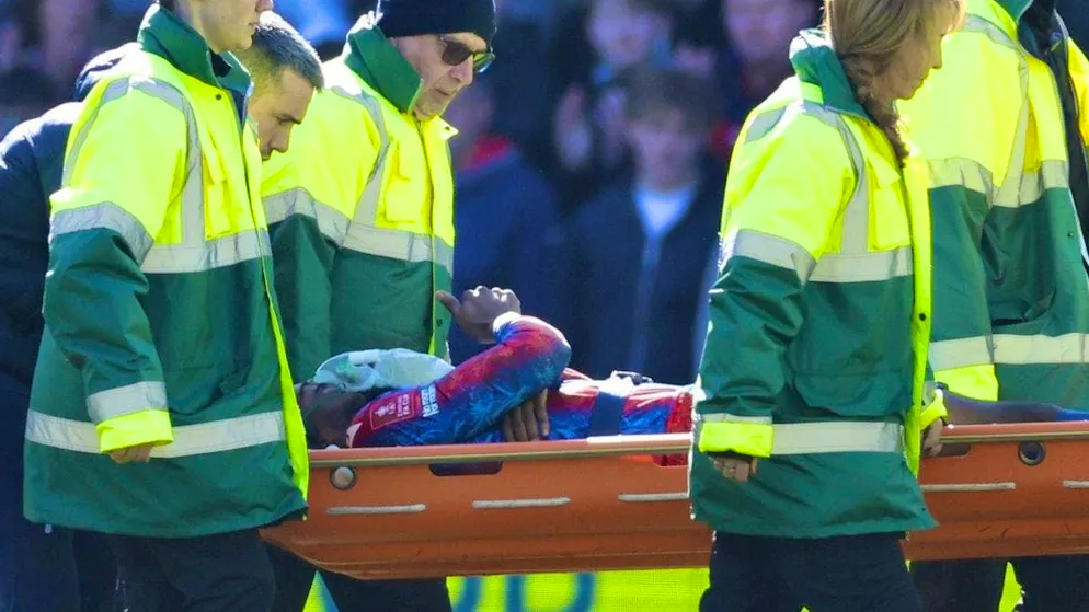 Jean-Philippe Mateta has to be carried off after a brutal foul in the cup game against Millwall FC.