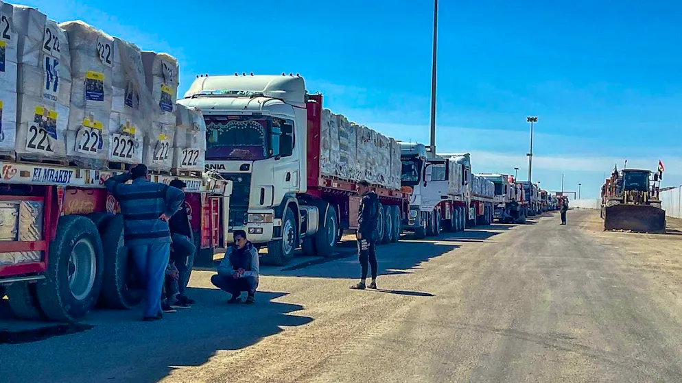 Trucks stand on the Egyptian side of the Rafah border crossing after Israel blocked the entry of aid supplies. Photo: Mohammed Arafat/AP/dpa