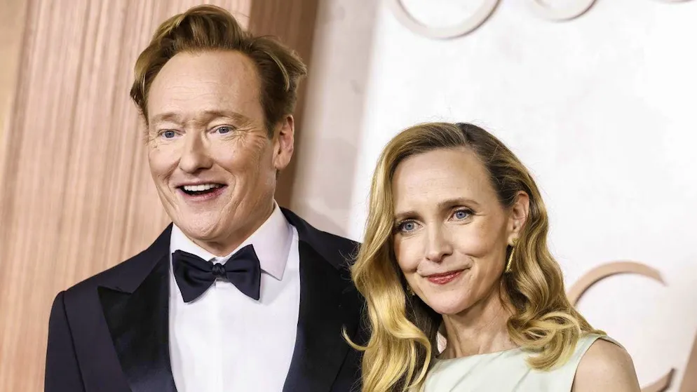 Oscars host Conan O'Brien (left) with his wife Liza Powel O'Brien as they arrive at the Dolby Theater in Los Angeles.