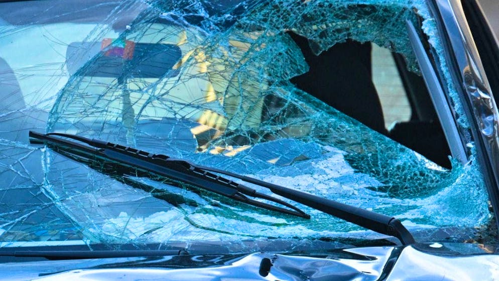 A damaged vehicle stands on an access road to the Rhine bridge. Following an incident involving a car in Mannheim city center that left at least two people dead and several injured, the suspected driver has been arrested, according to police. According to police, a vehicle had driven into a crowd of people. Photo: Boris Roessler/dpa
