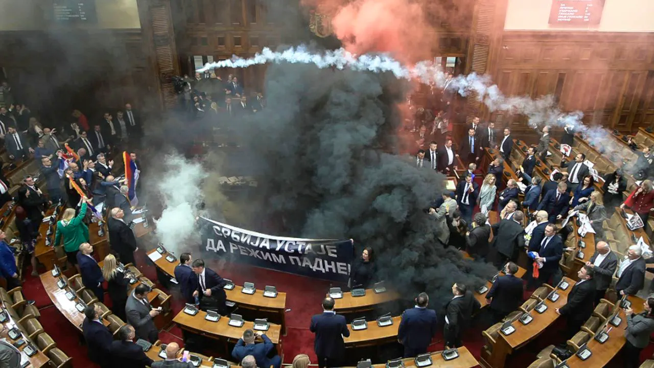 Serbia. Smoke bombs during riot in Serbian parliament