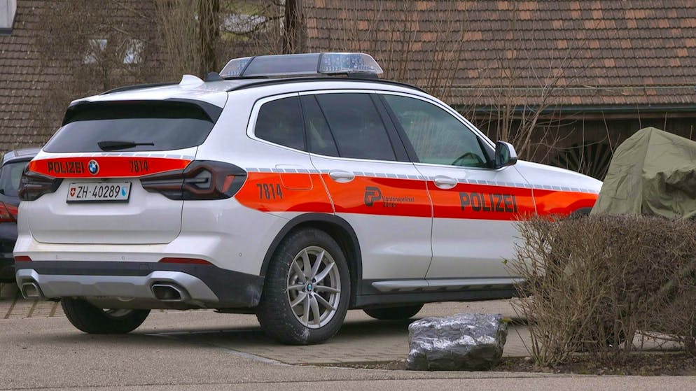 An emergency vehicle in front of the man's house. 