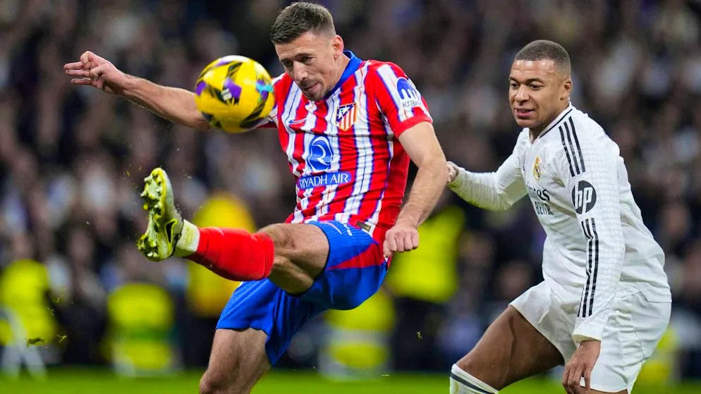 Atlético's Clement Lenglet against Real's Kylian Mbappé.