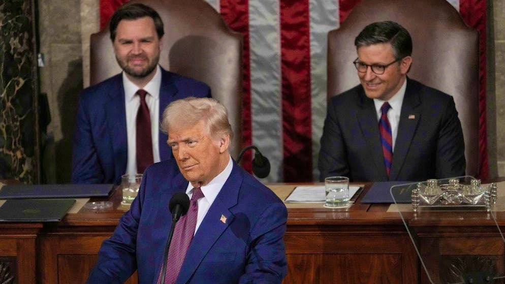 US President Donald Trump during his first speech to the US Congress since taking office on January 20. Behind him are his running mate J.D. Vance (left) and the Speaker of the House of Representatives.