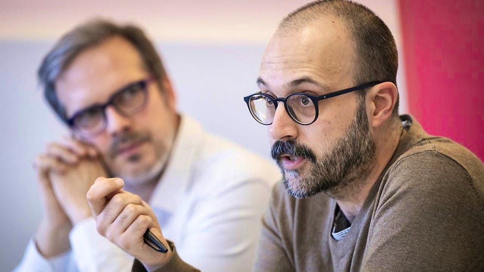Trade unions mobilize staff at grassroots level with care manifesto - Gallery. Samuel Burri, co-industry manager for care at the Unia trade union, right, speaks alongside Nicolas Pons-Vignon, project manager of the Care Manifesto.