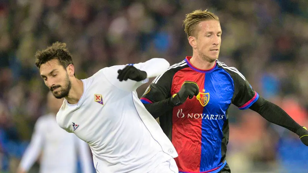 Davide Astori (left) in a duel against Basel's Marc Janko during the Europa League group match in November 2015.