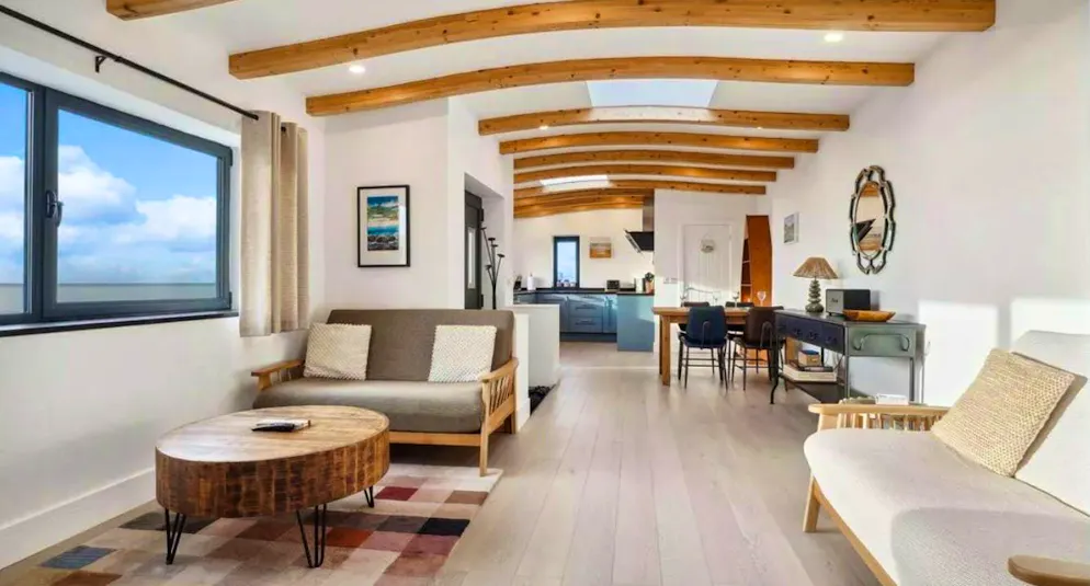 A beautiful little house reminiscent of a dacha, finca and bungalow on the beach.