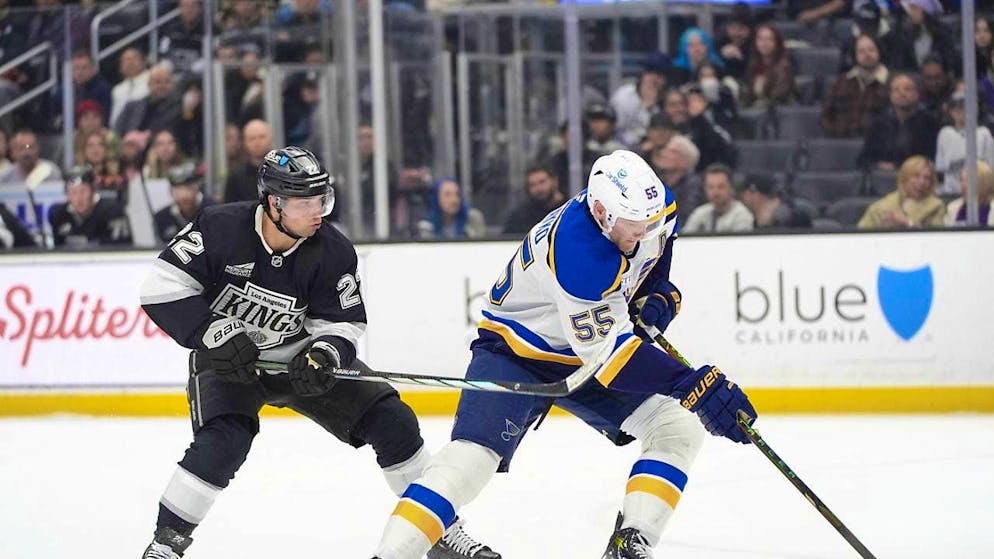 Kevin Fiala (left) in pursuit of Colton Parayko of the St. Louis Blues