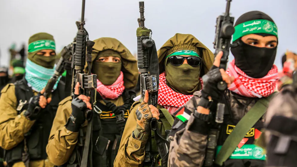 ARCHIV - Vermummte und bewaffnete Mitglieder der Terrororganisation Hamas. (zu dpa: «Hamas kritisiert Äußerungen von Trump») Foto: Abed Rahim Khatib/dpa