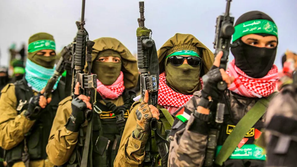 ARCHIVE - Masked and armed members of the terrorist organization Hamas. (to dpa: "Hamas criticizes Trump's statements") Photo: Abed Rahim Khatib/dpa