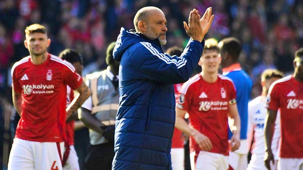 Nottingham coach Nuno Espirito Santo applauds his players.