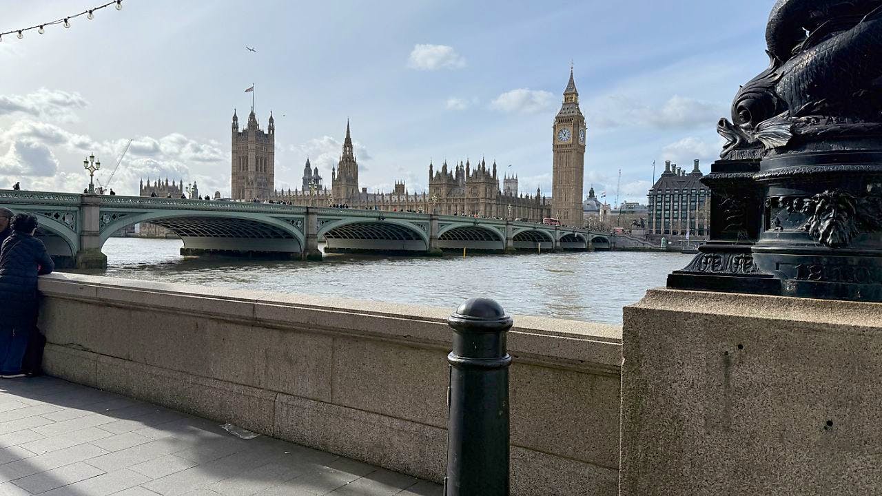 Great Britain. Protest on Big Ben: Man with Palestinian flag on tower