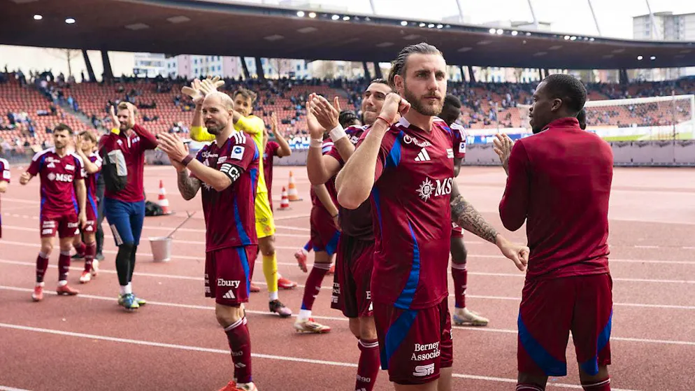 Geneva celebrate their away win at the Letzigrund in Zurich