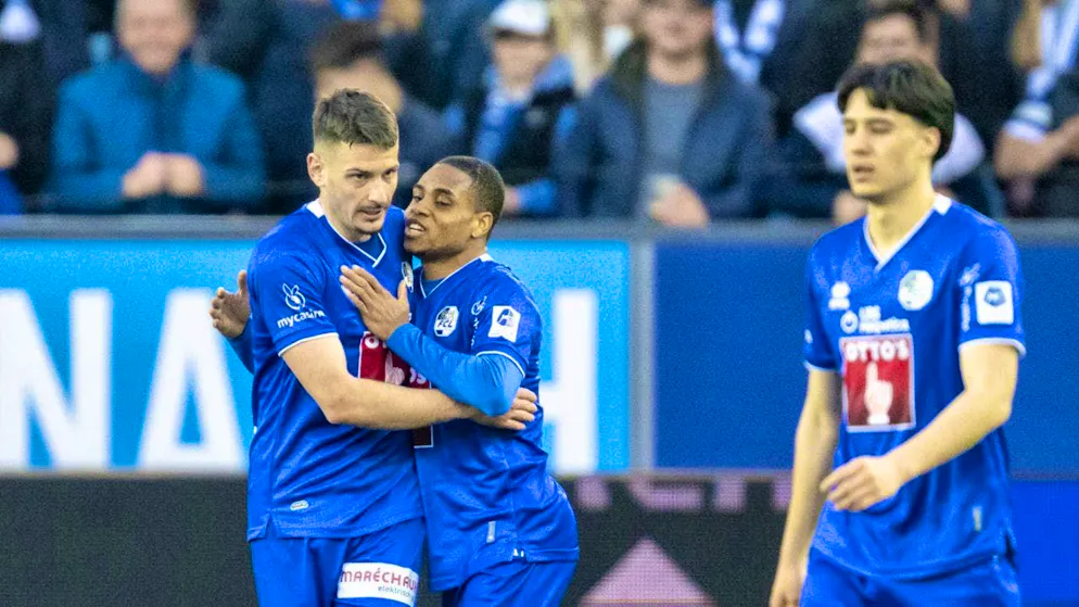 Stefan Knezevic receives congratulations from Thibault Klidje after the 1-1 draw