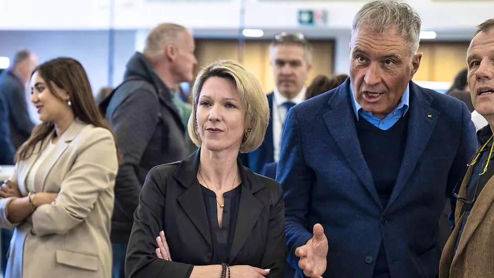 SVP cantonal president Remy Wyssmann (right) and SVP cantonal council candidate Sibylle Jeker watch the results come in at the election center in Solothurn.