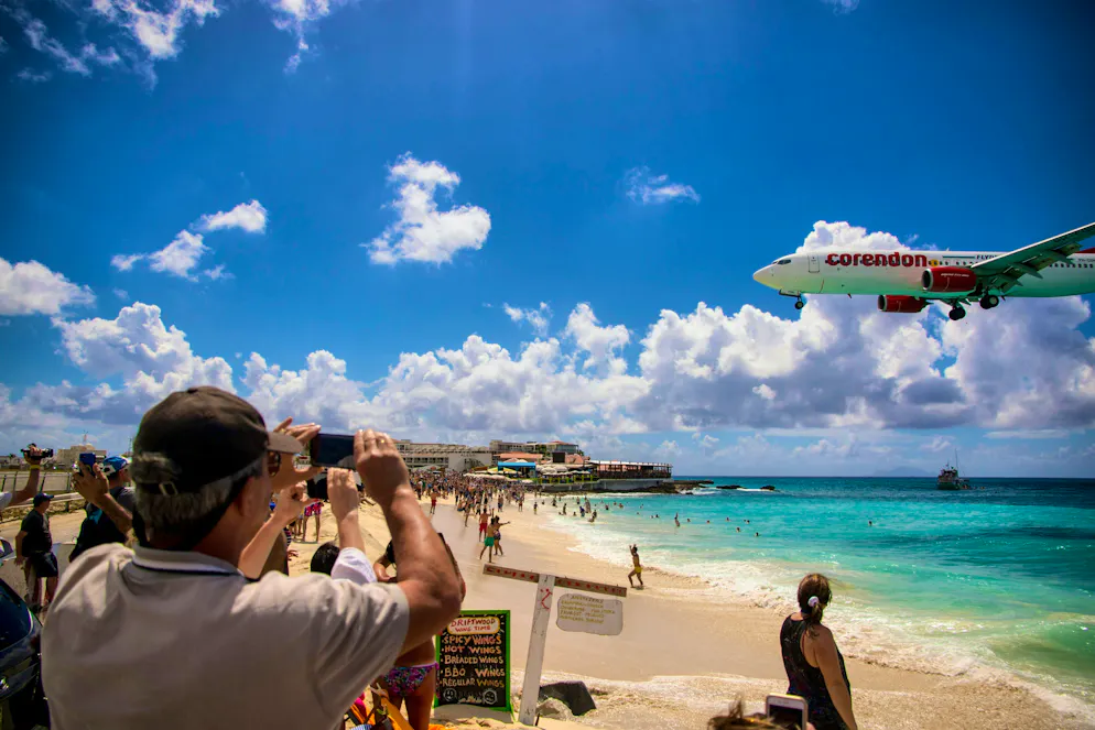 In Sint Maarten, airplanes come dangerously close to the beach.