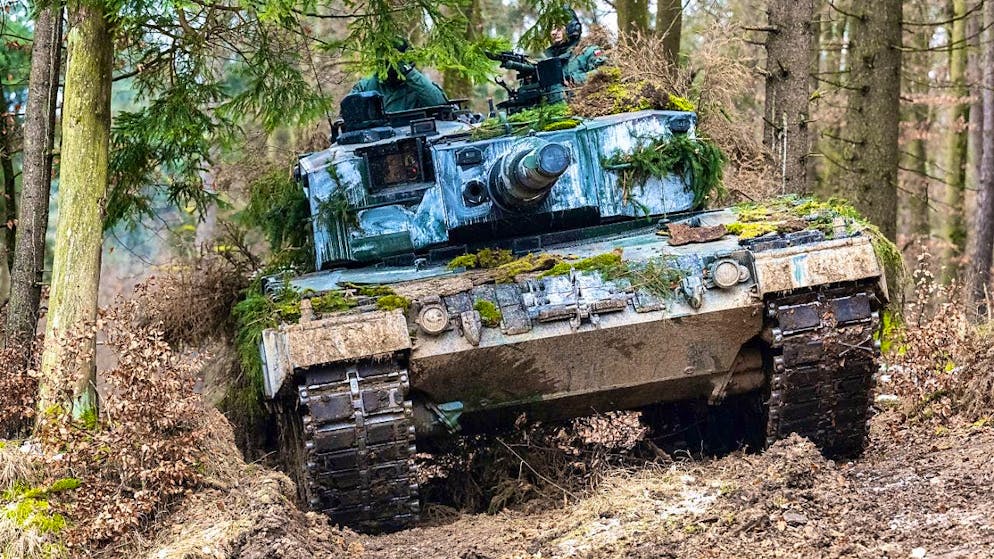 ARCHIVE - A Polish army Leopard 2 tank stands in the forest. Photo: Armin Weigel/dpa