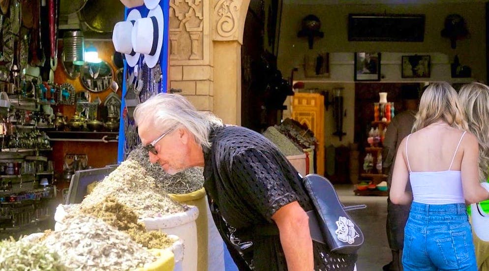 Geiss daughter worried about parents after pharmacy trip. Robert Geiss sniffs a herbal mixture.
