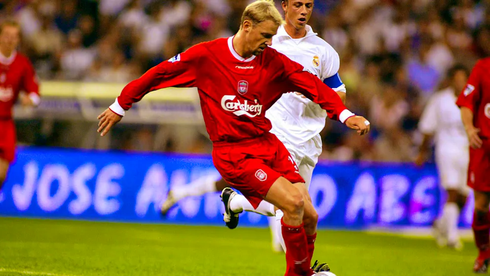Liverpool legend Stéphane Henchoz in action against Real Madrid.