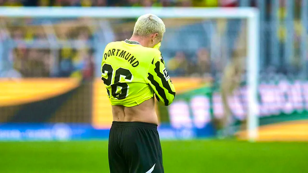 Borussia Dortmund is lacking a lot this season - Gallery. Julian Ryerson buries his face behind his jersey