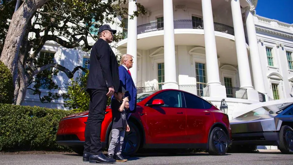 Elon Musk (left) and Donald Trump pose with Teslas in front of the White House: the South African has once again taken his son to the 35-minute press event.