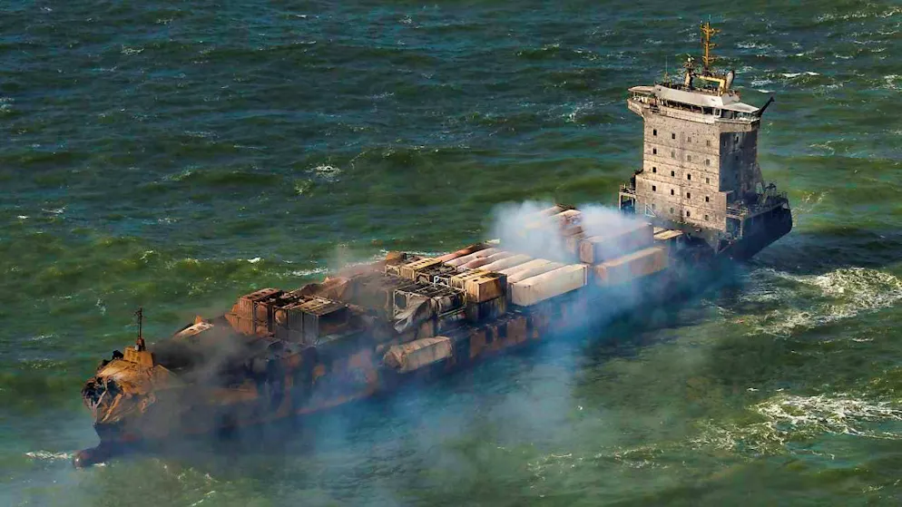 Smoke billows from the cargo ship MV Solong in the North Sea off the coast of Yorkshire in England after it collided with the oil tanker MV Stena Immaculate on Monday. Photo: Dan Kitwood/getty pool/AP/dpa